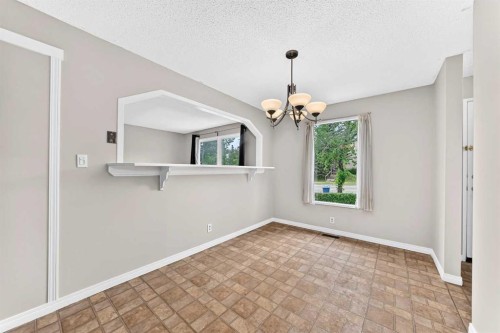 19 Falshire Drive Ne, Calgary, AB - Indoor Photo Showing Other Room