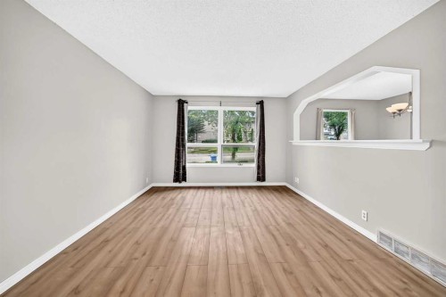 19 Falshire Drive Ne, Calgary, AB - Indoor Photo Showing Other Room