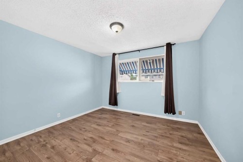 19 Falshire Drive Ne, Calgary, AB - Indoor Photo Showing Other Room