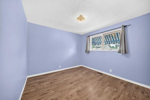 19 Falshire Drive Ne, Calgary, AB - Indoor Photo Showing Other Room