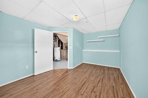 19 Falshire Drive Ne, Calgary, AB - Indoor Photo Showing Other Room