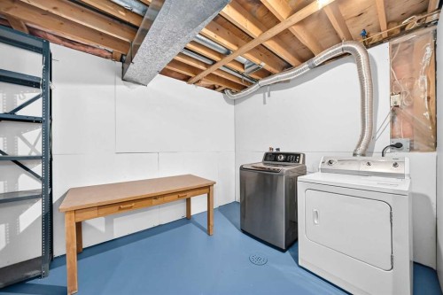 19 Falshire Drive Ne, Calgary, AB - Indoor Photo Showing Laundry Room