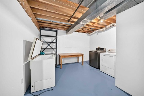 19 Falshire Drive Ne, Calgary, AB - Indoor Photo Showing Laundry Room