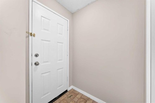19 Falshire Drive Ne, Calgary, AB - Indoor Photo Showing Other Room
