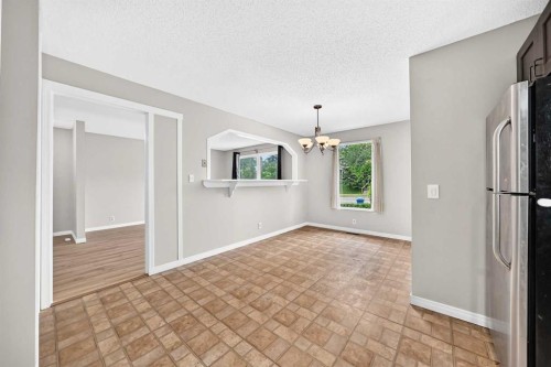 19 Falshire Drive Ne, Calgary, AB - Indoor Photo Showing Other Room