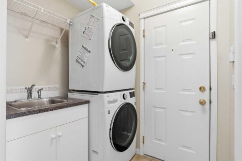 120 Sierra Morena Landing Sw, Calgary, AB - Indoor Photo Showing Laundry Room