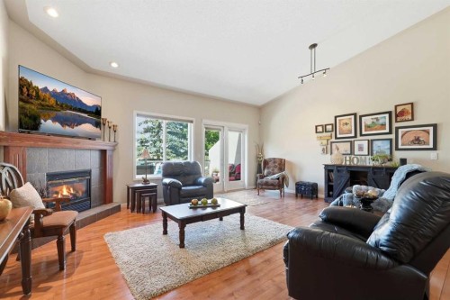 120 Sierra Morena Landing Sw, Calgary, AB - Indoor Photo Showing Living Room With Fireplace