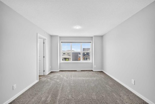 97 Herron Mews Ne, Calgary, AB - Indoor Photo Showing Other Room