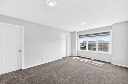 97 Herron Mews Ne, Calgary, AB - Indoor Photo Showing Other Room