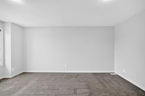 97 Herron Mews Ne, Calgary, AB - Indoor Photo Showing Other Room