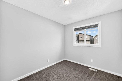 97 Herron Mews Ne, Calgary, AB - Indoor Photo Showing Other Room