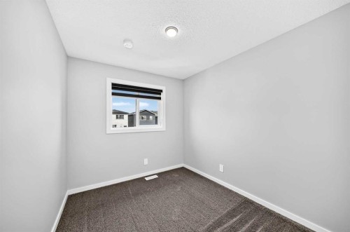 97 Herron Mews Ne, Calgary, AB - Indoor Photo Showing Other Room