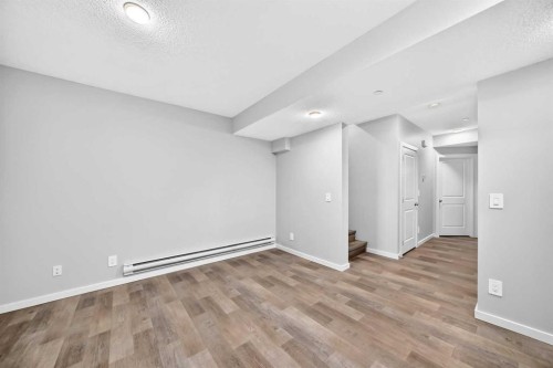 97 Herron Mews Ne, Calgary, AB - Indoor Photo Showing Other Room