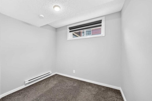 97 Herron Mews Ne, Calgary, AB - Indoor Photo Showing Other Room