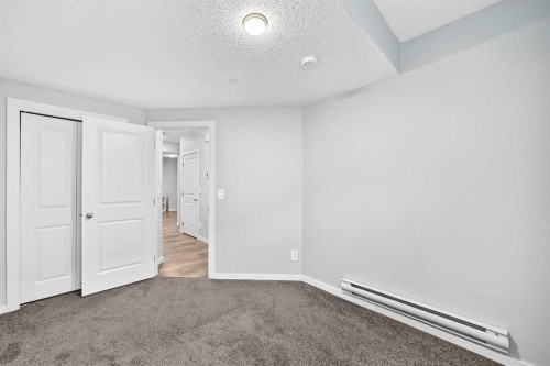 97 Herron Mews Ne, Calgary, AB - Indoor Photo Showing Other Room