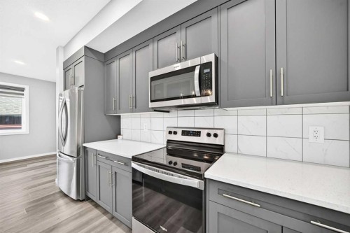 97 Herron Mews Ne, Calgary, AB - Indoor Photo Showing Kitchen