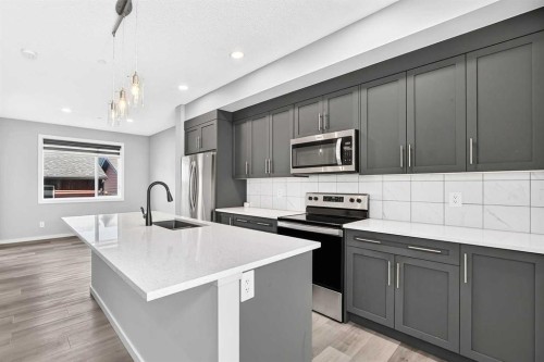 97 Herron Mews Ne, Calgary, AB - Indoor Photo Showing Kitchen With Upgraded Kitchen