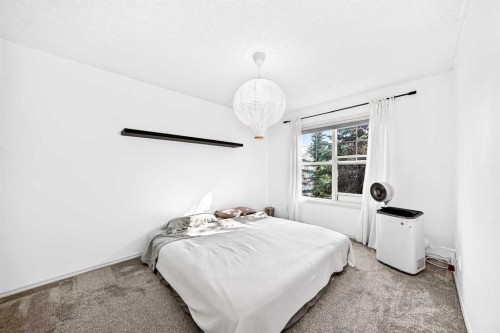 252 Mckenzie Towne Link Se, Calgary, AB - Indoor Photo Showing Bedroom