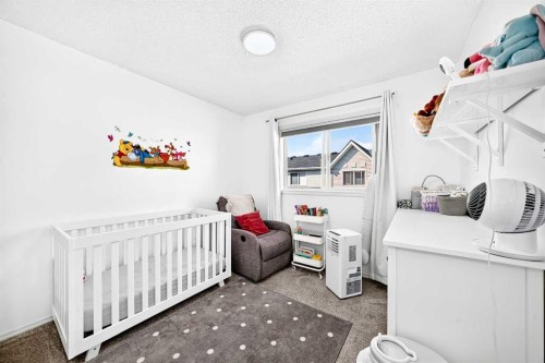 252 Mckenzie Towne Link Se, Calgary, AB - Indoor Photo Showing Bedroom