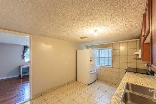 2628 Capitol Hill Crescent Nw, Calgary, AB - Indoor Photo Showing Kitchen With Double Sink