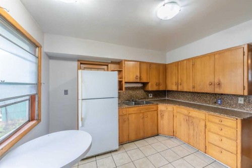 2628 Capitol Hill Crescent Nw, Calgary, AB - Indoor Photo Showing Kitchen With Double Sink