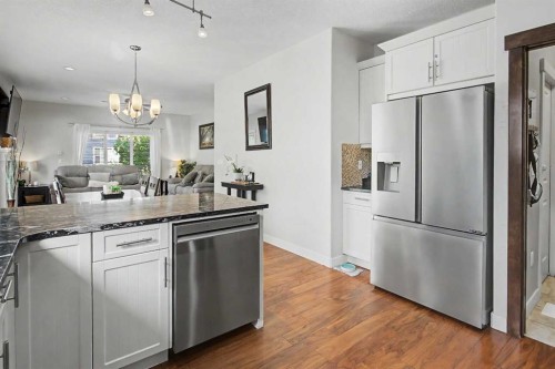2 Baywater Cape, Airdrie, AB - Indoor Photo Showing Kitchen With Stainless Steel Kitchen With Upgraded Kitchen