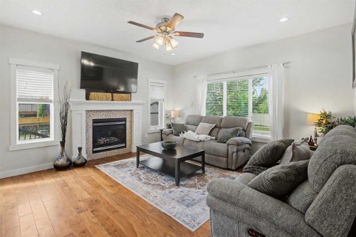 2 Baywater Cape, Airdrie, AB - Indoor Photo Showing Living Room With Fireplace