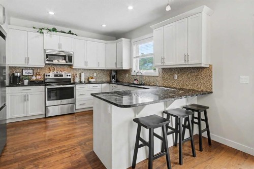 2 Baywater Cape, Airdrie, AB - Indoor Photo Showing Kitchen With Stainless Steel Kitchen