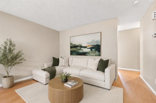 70 Edgeburn Crescent, Calgary, AB - Indoor Photo Showing Living Room