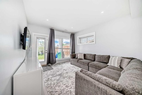33 Redstone Drive Ne, Calgary, AB - Indoor Photo Showing Living Room