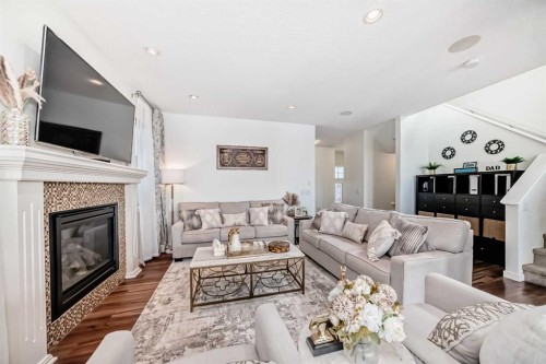 33 Redstone Drive Ne, Calgary, AB - Indoor Photo Showing Living Room With Fireplace