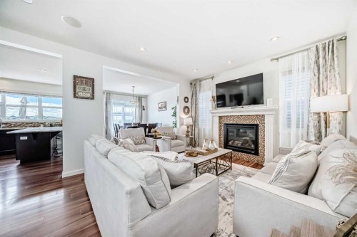 33 Redstone Drive Ne, Calgary, AB - Indoor Photo Showing Living Room With Fireplace