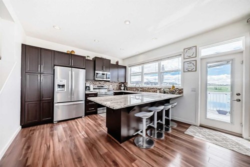 33 Redstone Drive Ne, Calgary, AB - Indoor Photo Showing Kitchen With Upgraded Kitchen