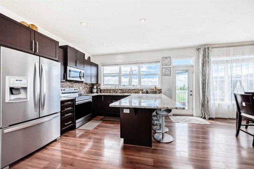 33 Redstone Drive Ne, Calgary, AB - Indoor Photo Showing Kitchen With Upgraded Kitchen