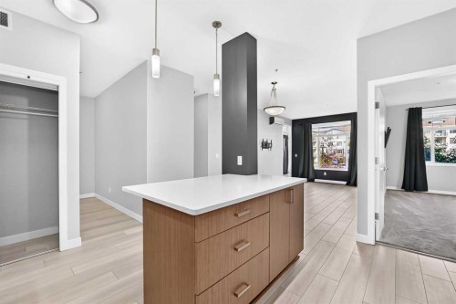 202-10 Auburn Bay Link Se, Calgary, AB - Indoor Photo Showing Other Room