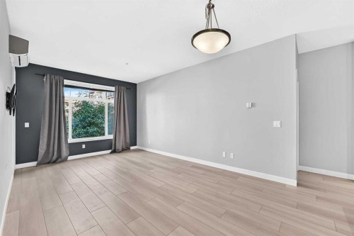 202-10 Auburn Bay Link Se, Calgary, AB - Indoor Photo Showing Other Room