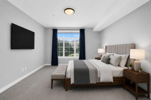 202-10 Auburn Bay Link Se, Calgary, AB - Indoor Photo Showing Bedroom