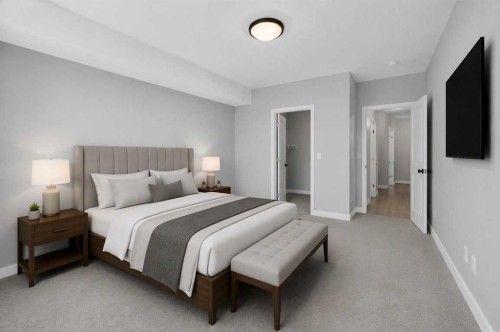 202-10 Auburn Bay Link Se, Calgary, AB - Indoor Photo Showing Bedroom