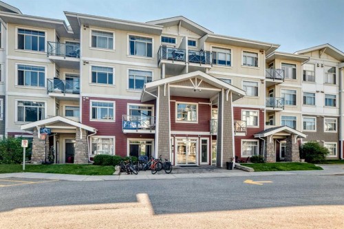 202-10 Auburn Bay Link Se, Calgary, AB - Outdoor With Balcony With Facade