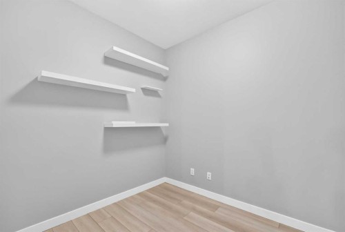 202-10 Auburn Bay Link Se, Calgary, AB - Indoor With Storage