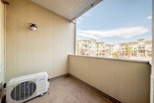 202-10 Auburn Bay Link Se, Calgary, AB - Outdoor With Balcony With Exterior