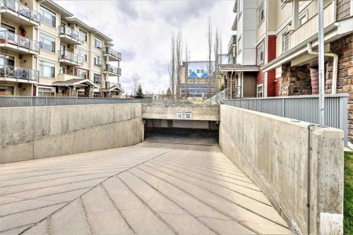 202-10 Auburn Bay Link Se, Calgary, AB - Outdoor With Balcony