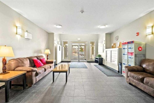 202-10 Auburn Bay Link Se, Calgary, AB - Indoor Photo Showing Other Room