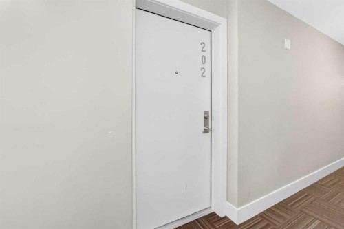 202-10 Auburn Bay Link Se, Calgary, AB - Indoor Photo Showing Other Room
