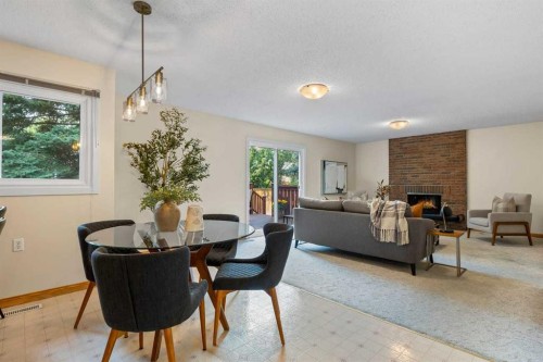 92 Canova Road Sw, Calgary, AB - Indoor With Fireplace