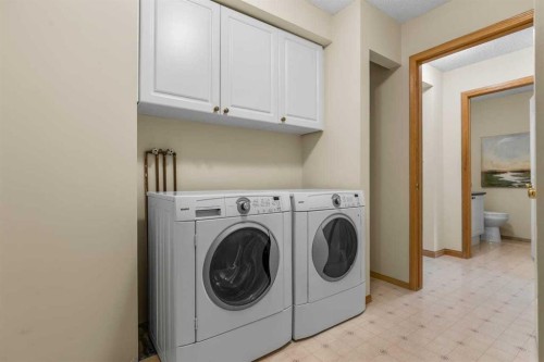 92 Canova Road Sw, Calgary, AB - Indoor Photo Showing Laundry Room