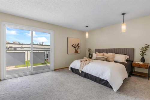 92 Canova Road Sw, Calgary, AB - Indoor Photo Showing Bedroom