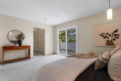 92 Canova Road Sw, Calgary, AB - Indoor Photo Showing Bedroom