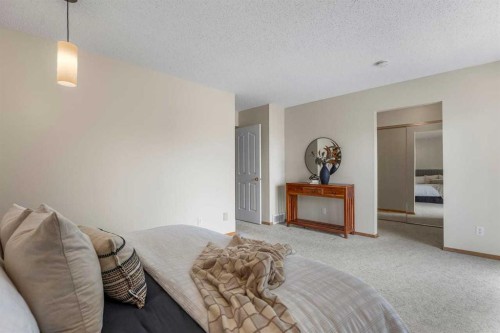 92 Canova Road Sw, Calgary, AB - Indoor Photo Showing Bedroom
