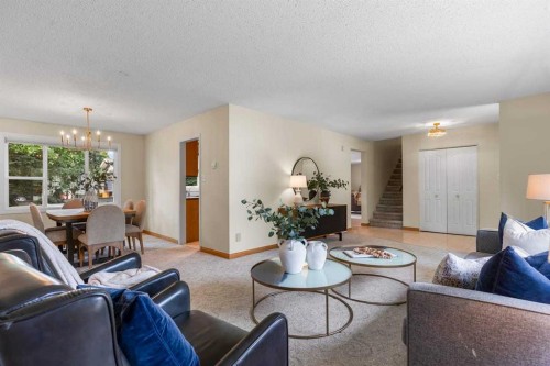 92 Canova Road Sw, Calgary, AB - Indoor Photo Showing Living Room